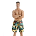 Men's quick-dry beach shorts featuring yellow tropical floral and green palm leaf prints - Yellow Leaf