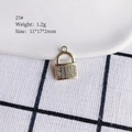 Detailed macro view of gold-plated padlock pendant with sparkling zircon inlays for DIY jewelry - 25# (Rhinestone Lock)