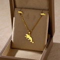 Detailed view of leopard-shaped gold jewelry set with necklace and earrings in a gift box - Leopard Shape (TZ-461)