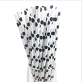 Farm cow themed birthday party paper straws with black polka dots in a clear glass - Cow Straws 20pcs