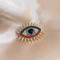 Retro evil eye brooch in gold finish with colorful rhinestones and enamel details - Evil Eye Black Pearl Brooch