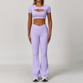 Light purple yoga set with cutout short sleeve top and high-waist flared leggings - XL / Top And Bottom / Short Sleeve + Flare Pants / Lilac Purple