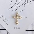 Detail of a golden heart cross pendant with pearls and rhinestones measuring 42x31mm - 2# Pearl Rhinestone Inlaid Cross