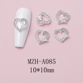 Macro shot of silver heart-shaped nail charm with rhinestones and 3D butterfly design - Silver Hollow Heart with Inlaid Butterfly (A085)