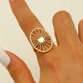 Golden stainless steel heart ring with sunburst hollow design on finger - 18K Gold Plated Radial Heart (11125)