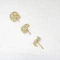 Macro shot of minimalist gold geometric stud earrings with double layered arc design - 3-Piece Stud Earring Set / Gold
