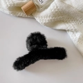 Detail of a black plush hair claw clip with soft faux fur texture for winter hair styling - Crossed / Black