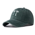 Close-up of vintage washed green baseball cap with white coconut tree embroidery detail - Dark Green