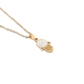Detailed close-up of a gold Hamsa hand pendant necklace with sparkling white crystals - Gold Crystal Style
