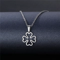 Minimalist silver stainless steel hollow four-leaf clover necklace on dark blue display - Hollow Four-leaf Clover