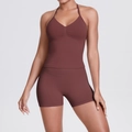 Two-piece seamless knit yoga set in coffee brown featuring halter top and high waist shorts - Brown