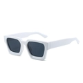 Modern thick white square sunglasses with dark grey UV lenses in a 45-degree side view - White Frame Dark Grey Lens