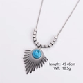 Detail van vintage roestvrijstalen ketting met turkoois en geometrische spike hanger - Zilver (Blauwe Turkoois Textuur)