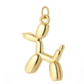 Detail view of a polished golden balloon dog pendant with a smooth metallic finish - Gold Balloon Dog