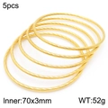 Set of 5 gold-plated titanium steel bangles featuring a detailed spiral twisted texture - 5 Rings Set / Gold