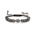 Verstellbares schwarzes Perlenarmband mit Hand der Fatima und türkisfarbenem Stein in der Mitte - Gun Black Hamsa Hand Stil