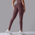 Nahtlose High-Waist Yoga-Leggings in tiefem Pflaumenviolett mit Push-Up-Effekt am Gesäß - L / Granatapfelviolett