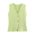 Close-up of light green knit vest featuring V-neckline and decorative gold buttons - Green Sleeveless / S