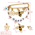 Detail view of Evil Eye brooch with Happy beads, bee and flower charms and size labels - HAPPY Letter Flower Bee Evil Eye Style (BE1728YE00)