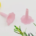 Mini pink plastic liquid funnels with petal-shaped rim for cosmetic bottle filling - Petal Shape / Nordic Pink