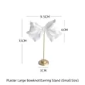 White plaster bow earring display stand with golden metal rod and round base 13cm - Small Gypsum Large Bowknot Earring Stand