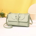 Detail of light green elephant crossbody bag with PU leather and adjustable strap - Green