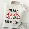 Off-white canvas tote bag featuring red-hatted Christmas gnomes and holiday prints - Gnome Chirstmas Error (09) / White