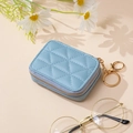 Light blue quilted PU leather cosmetic mini pouch with gold zipper and keychain detail - Sky Blue