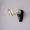 White skeleton hand wall hook with vintage resin texture for entryway decor - Milky White