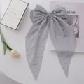 Elegant grey-blue chiffon bow hair clip with polka dot texture and long ribbon tails - Gray