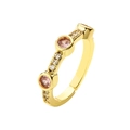 Elegante anello aperto dorato con due pietre rosa e zirconi bianchi su sfondo bianco - Aperto Regolabile / Rosa