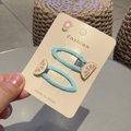 Glitter lemon decor hair clips in light blue fabric wrap on a fashion display card - Lemon (Pair)