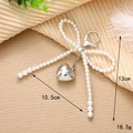 Silver heart and pearl bow keychain pendant for bags with size and weight details - White Pearl Bow Heart Pendant