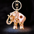 Golden elephant keychain with white enamel, sparkling crystals, and amber gems - Single OPP Bag Packaging / Crystal Elephant Champagne