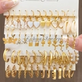 12-piece gold alloy earring set featuring pearls, butterfly, heart, snake and mushroom charms - Gold Pearl Butterfly Shell Snake Style (5922801)