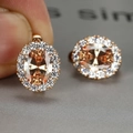 Champagne oval zirconia earrings with white halo diamonds in a rose gold setting - Rose Gold Champagne Zircon