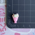Miniature resin ice cream sundae charm with pink cup and green scoop shown with ruler for scale - Pink Sundae Cup