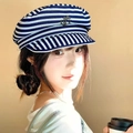 Detail of blue and white striped sailor hat with metal anchor on female model - M (56-58cm) / Navy Blue Painter Hat
