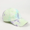 Detail of macaron tie-dye baseball cap featuring distressed rips and vintage street style - Neon Yellow