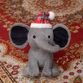 Sitting grey plush elephant doll with red and white checkered Christmas hat - Christmas Grey With Red Hat