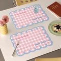Pink and white checkered placemat set with blue wavy edges and artistic typography - Pink & Blue (Sunny Joy)
