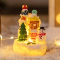 Leuchtendes Lebkuchenhaus aus Harz mit Schneemann und warmen LED-Lichtern - Schneemann Weihnachtsbaum Haus