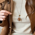 Vintage long necklace with brown rocking horse pendant and pearl detail on knitwear - Necklace-Silver-Coffee