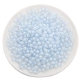 Light blue round acrylic beads for DIY necklace and jewelry making in white tray - Transparent Light Blue Round Beads