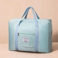 Light blue quilted travel bag with large capacity and durable nylon diamond pattern - Blue