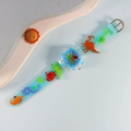 Light blue translucent dinosaur themed kids watch with 3D embossed colorful reptiles - Dinosaur / Light Blue