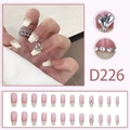 Long nude pink press-on nails D226 with French ombre and heart rhinestone accents - Nude Pink French Large Rhinestone Heart (D226)