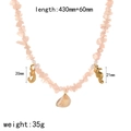 Detail view of gravel necklace with pink stones, gold sea pendants and size dimensions - Pink Natural Stone Ocean Style (TN3581)