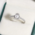 Elegant silver pearl flower ring with small zircons on a green jewelry box insert - Artificial Pearl Flower Cluster (White Gold Color 21)