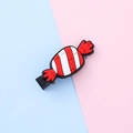 Red and white striped candy hair clip with a durable black metal duckbill grip - Candy